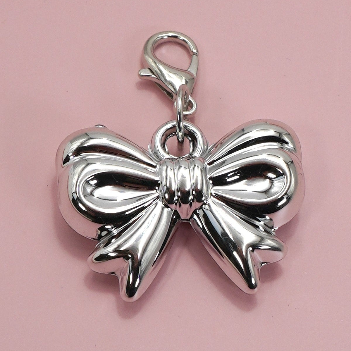 SILVER BOW CHARM
