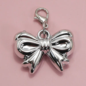 SILVER BOW CHARM