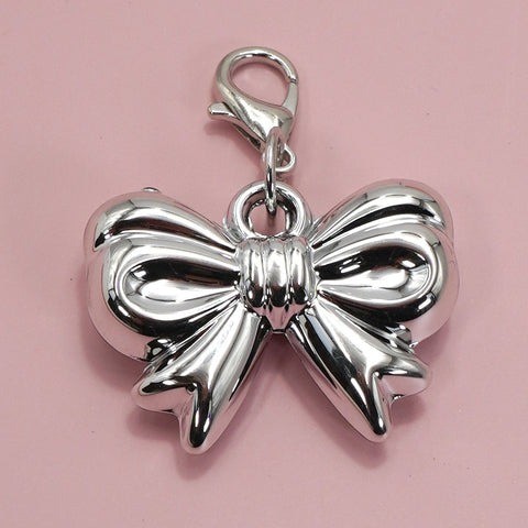 SILVER BOW CHARM